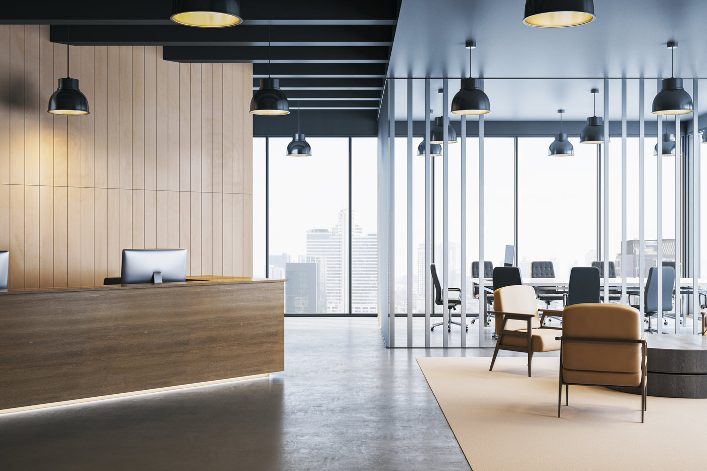 An office lobby with a wood reception desk, black pendant lights, floor-to-ceiling windows, and seating areas with tan chairs and a beige rug.