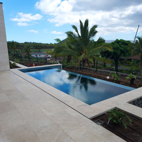 Slot Drain installed on deck surrounding infinity pool