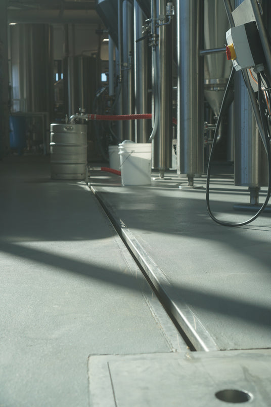 A 6000 Series Slot Drain Installed in the floor of a brewery