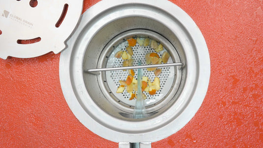 Circular catch basin strainer basket in use